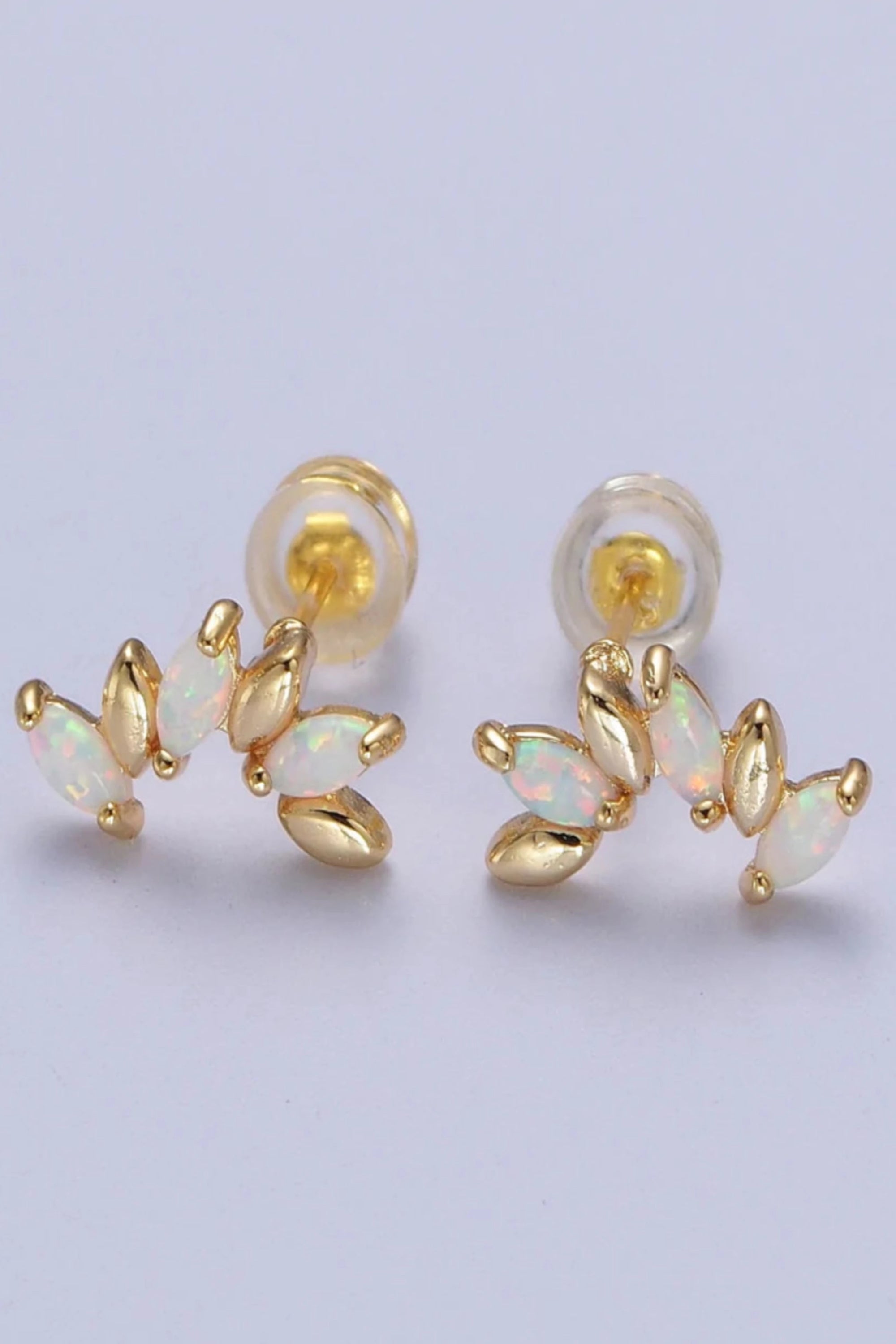 "Gold filled marquise patterned studs with alternating gold and opal marquise shapes."